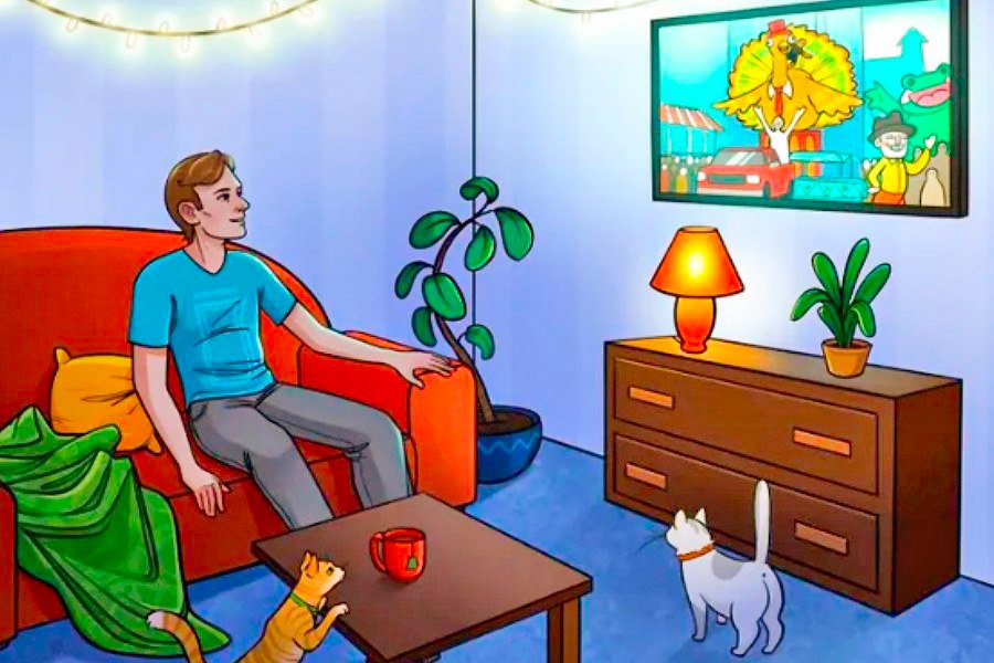 a man sitting on a couch watching tv